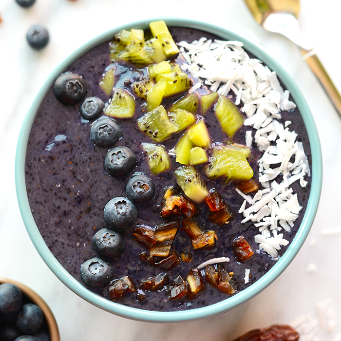 Smoothies are best eaten with a spoon! Make this thick and delicious Blueberry Date Smoothie Bowl and top it with all your favorite things for a quick breakfast or snack!