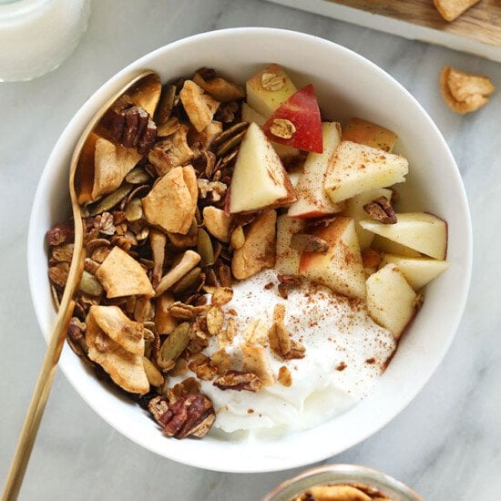 Homemade granola in bowl with Greek yogurt.