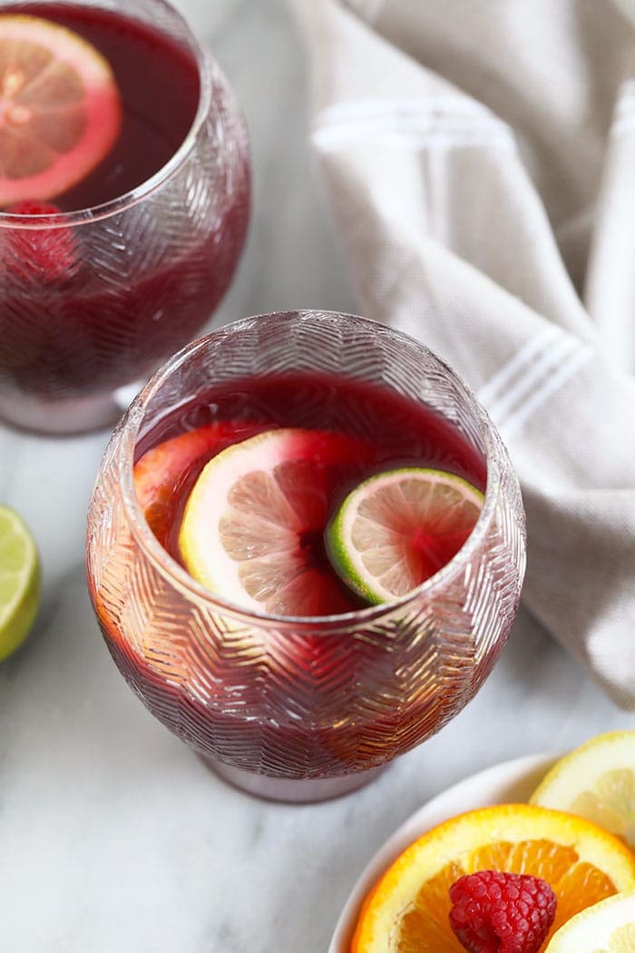 sangria in cup with sliced fruit