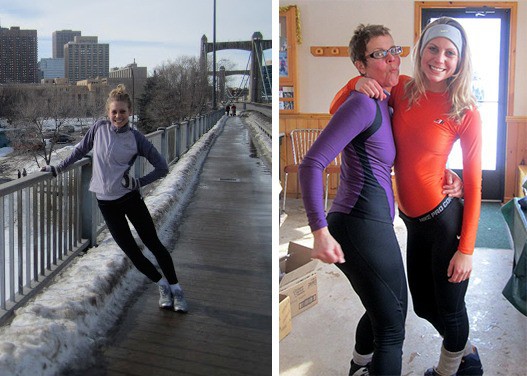 two women posing for a picture on a bridge.