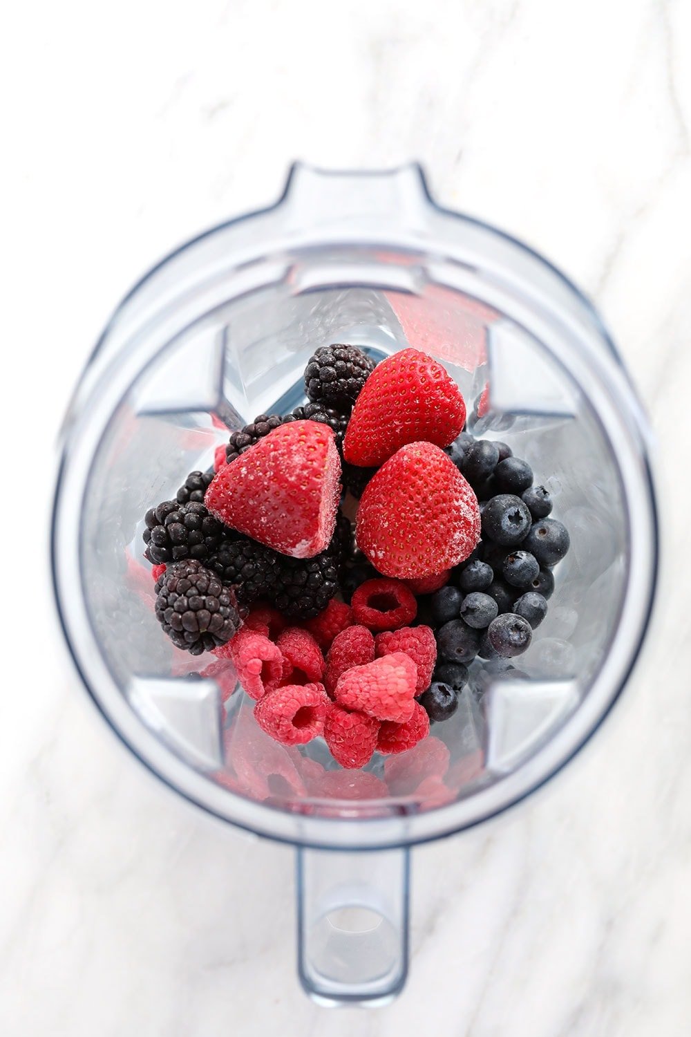 frozen berries in a blender