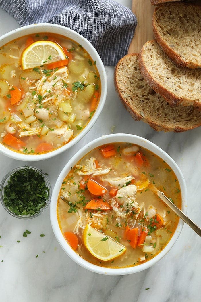 The healthy chicken soup that will make you feel better in an instant. Meet our amazing Chicken Quinoa Soup that's naturally gluten-free, protein-packed, and flavor-filled. Chicken quinoa soup in bowls