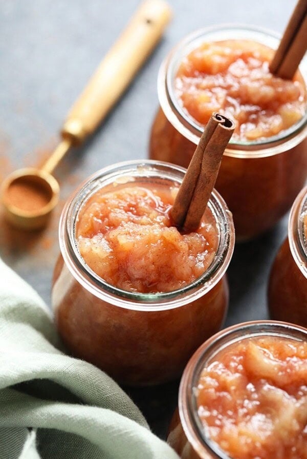 Cinnamon-infused applesauce packaged in jars.