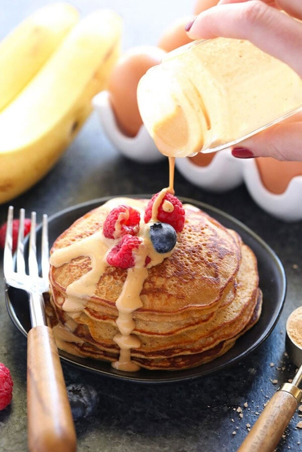 Peanut butter pancakes topped with bananas.