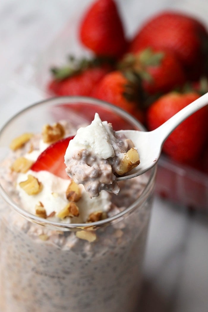 A spoonful of overnight oats with walnuts