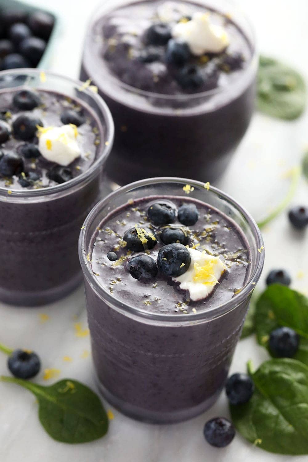 Blueberry smoothie in a cup.