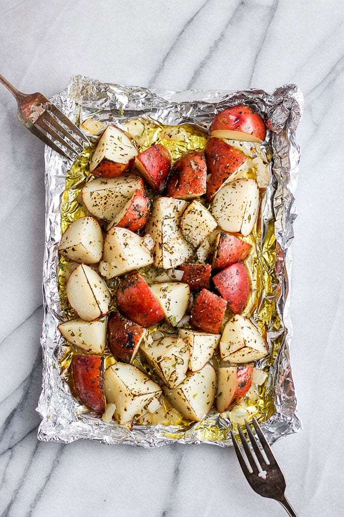 grilled potatoes on a piece of foil