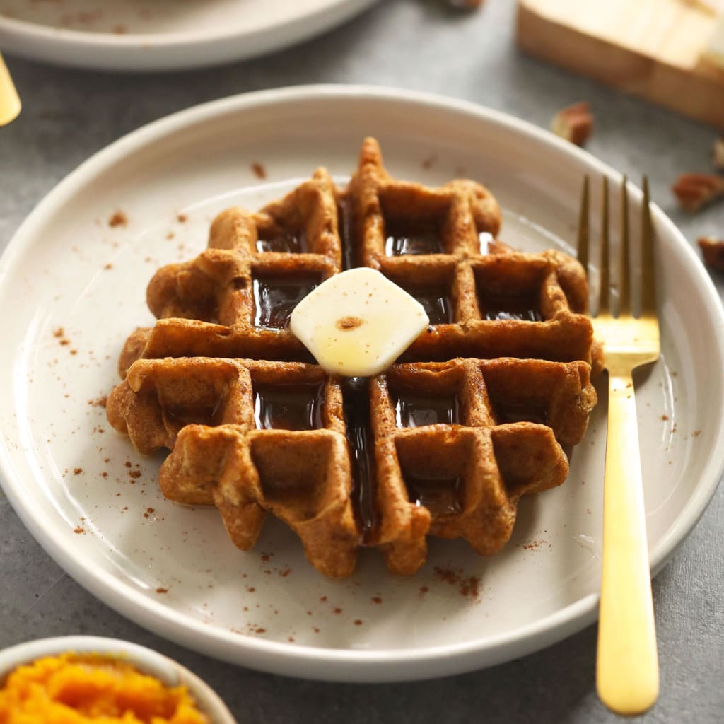 pumpkin waffle with butter on plate