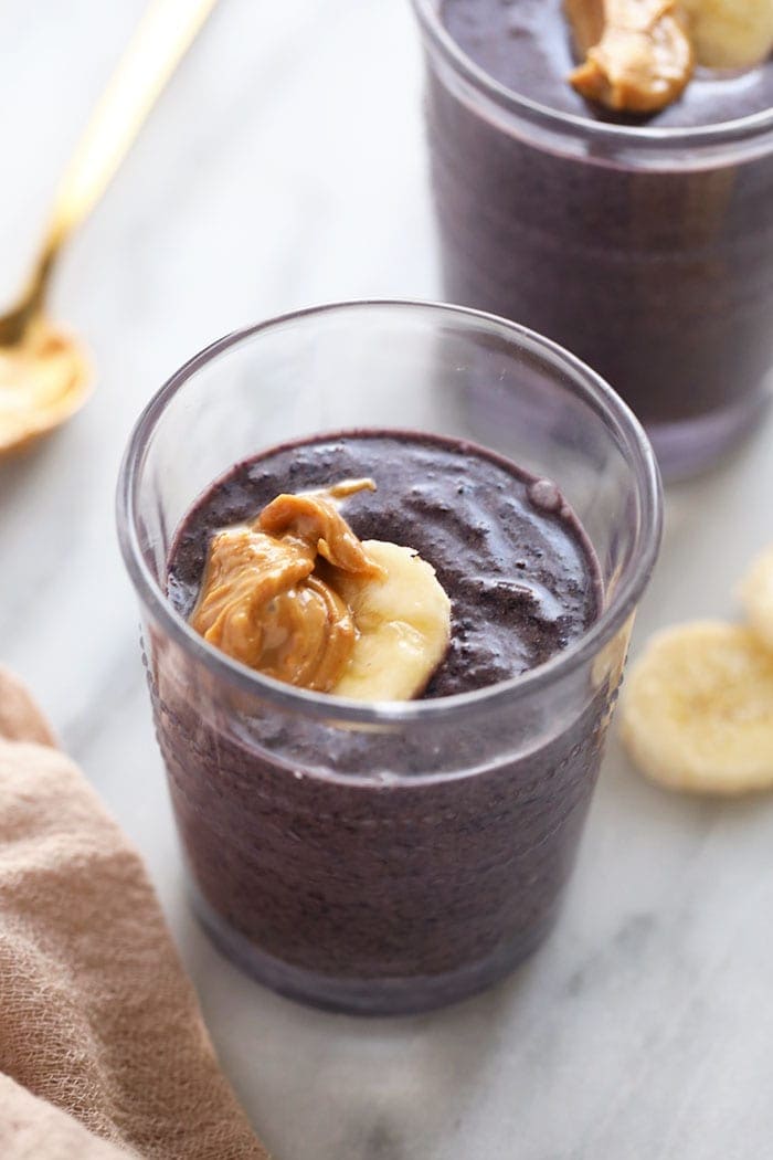 pumpkin berry smoothie with cashew butter in a glass