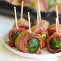 Bacon-wrapped Brussels sprouts on a plate.