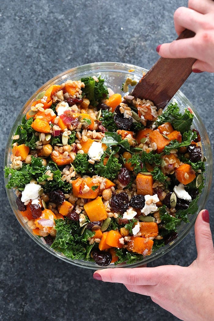 Stirring the kale and butternut squash salad. 