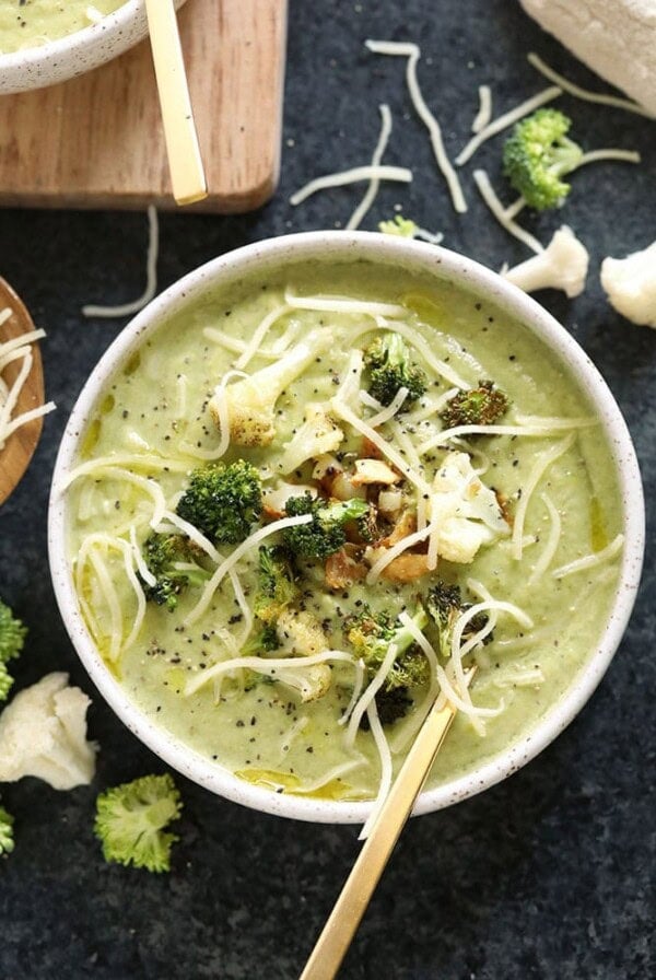 Lightened up broccoli cheese soup with noodles and parmesan cheese.
