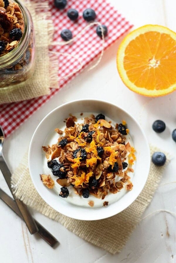 Healthy granola with oranges and blueberries.