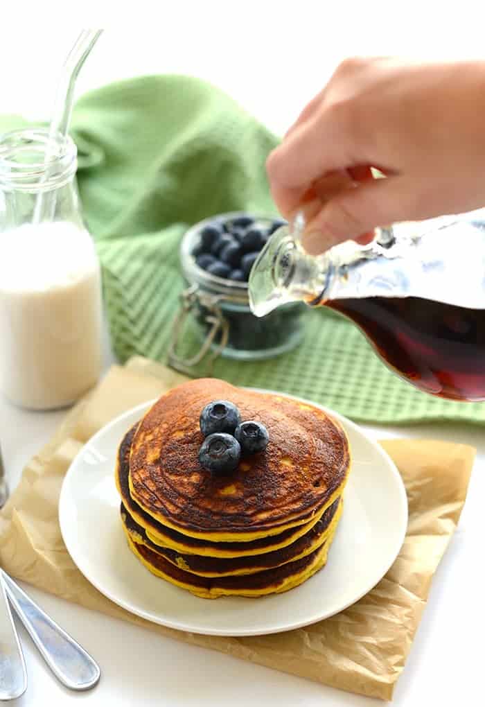 These are the best Paleo Coconut Flour Pancakes you'll ever make! They're made with just 4 main ingredients and a little coconut oil making them grain-free, dairy-free, and refined sugar free! 