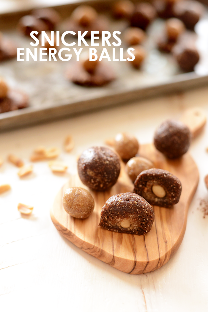 If you love snicker bars, you will love these healthier snickers energy balls! They are made with all of your favorite snickers flavors and ready in no-time. energy balls on a cutting board