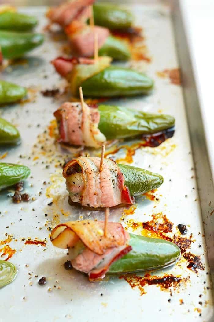 It's time to spice up your appetizers with these paleo-friendly bacon-wrapped jalapeño poppers! All you need are a few ingredients and 30 minutes!