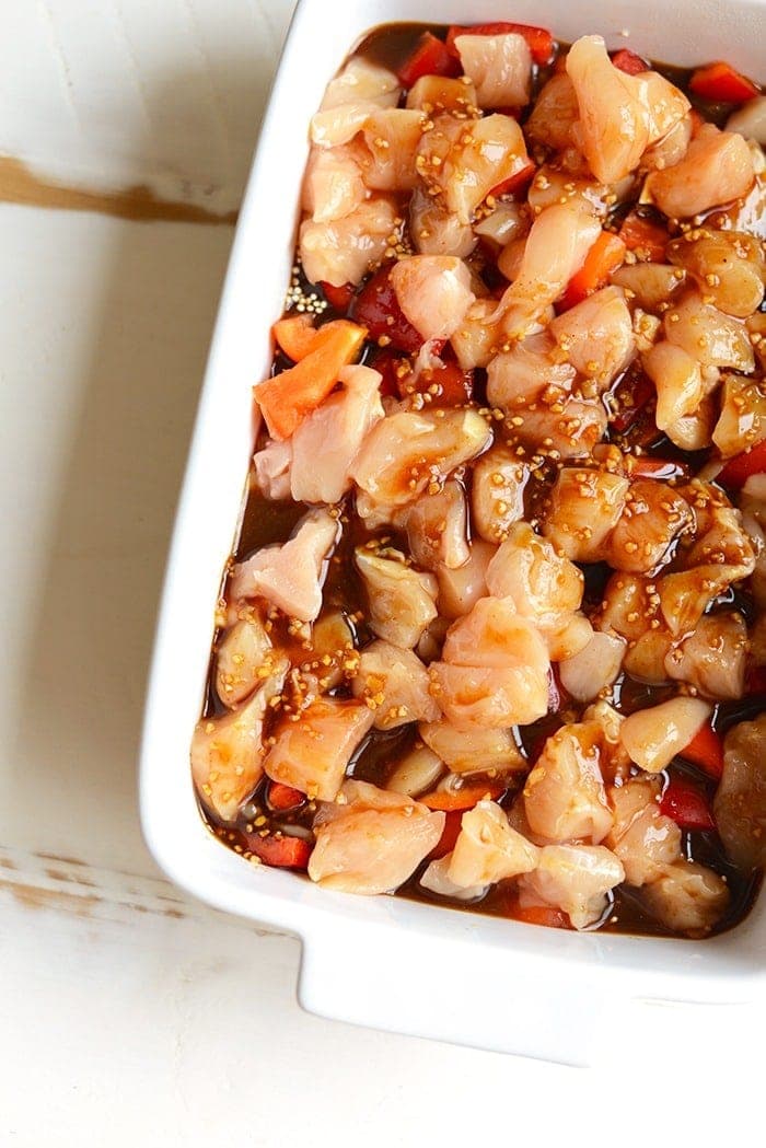 Make this Cashew Chicken Quinoa Bake for a high-protein, one-dish meal that the whole family will love! Meal prep at its finest. cashew chicken casserole in a casserole dish