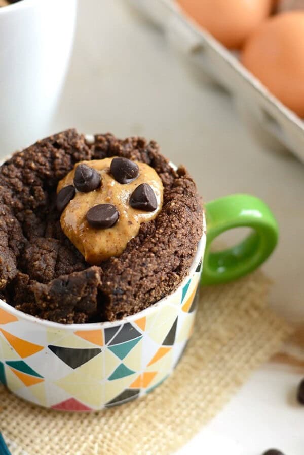 Coconut Flour Mug Cake with a chocolate chip cookie and a peanut butter cup.