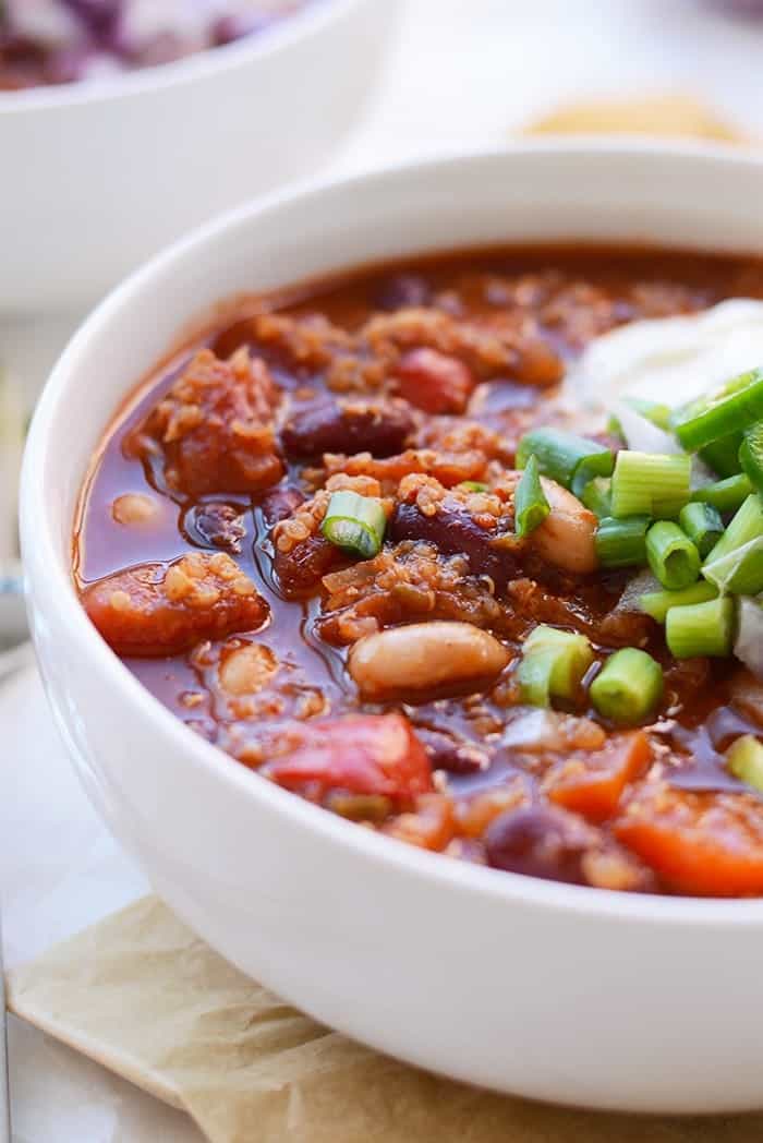 Looking for a high-protein vegetarian chili that's packed with flavor and easy to make? Use one single pot and make this Roasted Red Pepper Quinoa Chili!