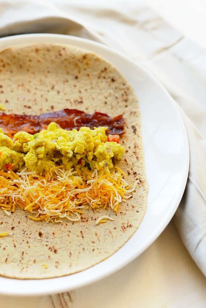 This is meal prep at its finest! Make these delicious protein-packed breakfast burritos to have before work or school all week long!