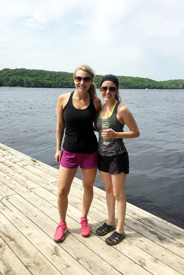Two women standing on a St. Croix River dock.