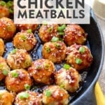Kung Pao chicken meatballs with sesame seeds cooked in a skillet.
