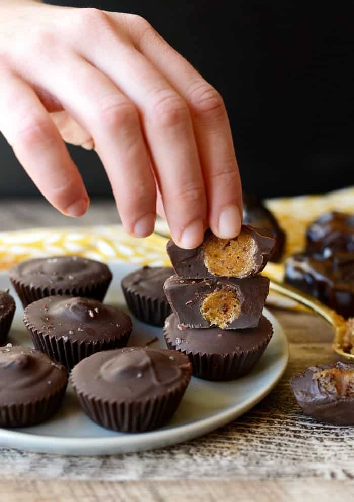 Healthy Salted Caramel Cups, it's a real thing! All you need are 4 simple ingredients to make this decadent dessert that's paleo and vegan-friendly! 
