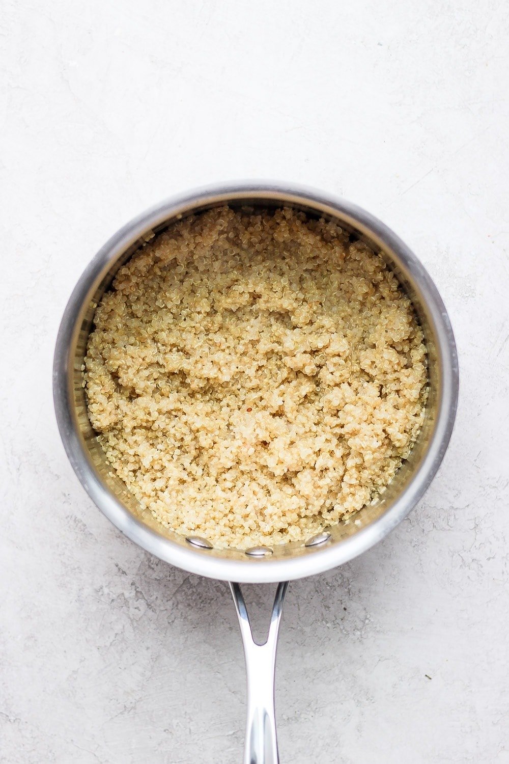 Cooked quinoa in a saucepan 