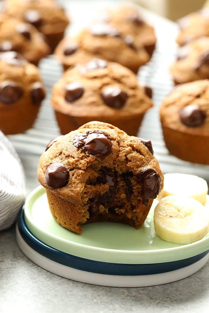 Banana chocolate chip muffin on a plate.