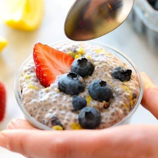 a serving of blueberry chia seed pudding with berries.
