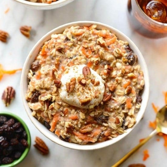 Carrot cake overnight oats with whipped cream.