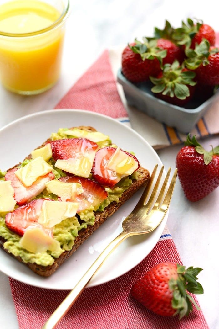 Jazz up your toast with some fresh fruit and cheese for an epic breakfast of Strawberry, Avocado, and White Cheddar Toast!