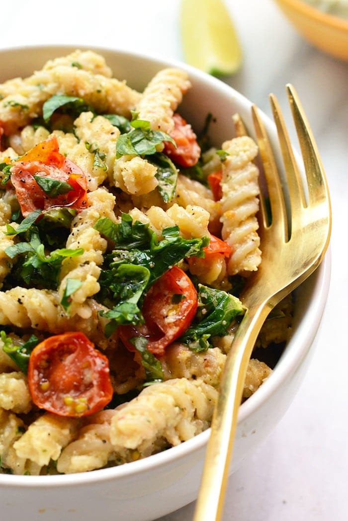 Looking to mix up your pasta dish? Make this delicious Creamy Vegan Pasta with Sautéed Kale, and Tomatoes.