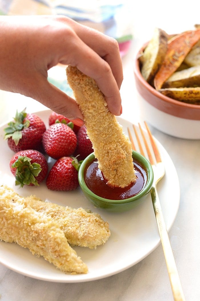 Who says chicken fingers are just for kids? NOT ME! You are going to love these coconut-crusted chicken fingers made with No Antibiotics-Ever chicken breast, unsweetened coconut flakes, and ground cashews. 