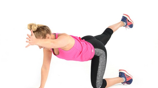 A woman performing a Plank workout on a white background.