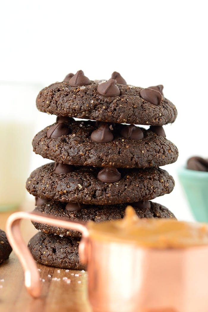 These double chocolate flourless peanut butter cookies are made sans flour, gluten, refined sugar, and butter! They're ooey gooey and taste like a cross between a peanut butter cookie and a brownie!