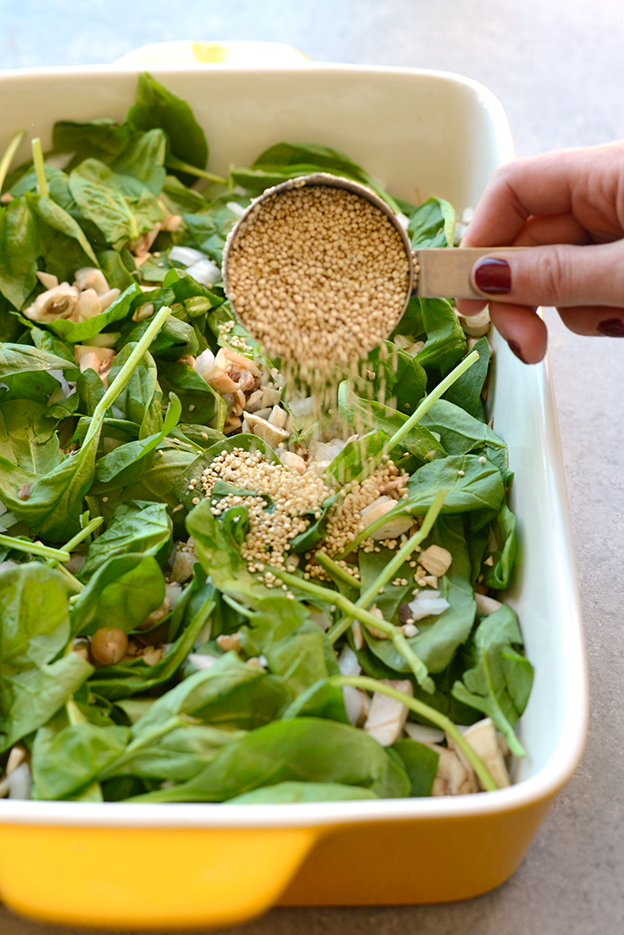 Try this lightened spinach quinoa lasagna casserole for a no-hassle, protein-packed dinner that's sans gluten and filled with so much flavor! 