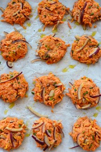 A tray of cheddar sweet potato hash browns on a baking sheet.