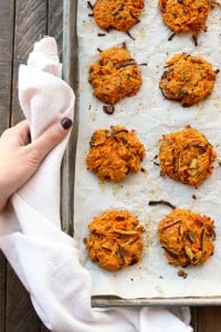 Cheddar sweet potato patties baked on a sheet.