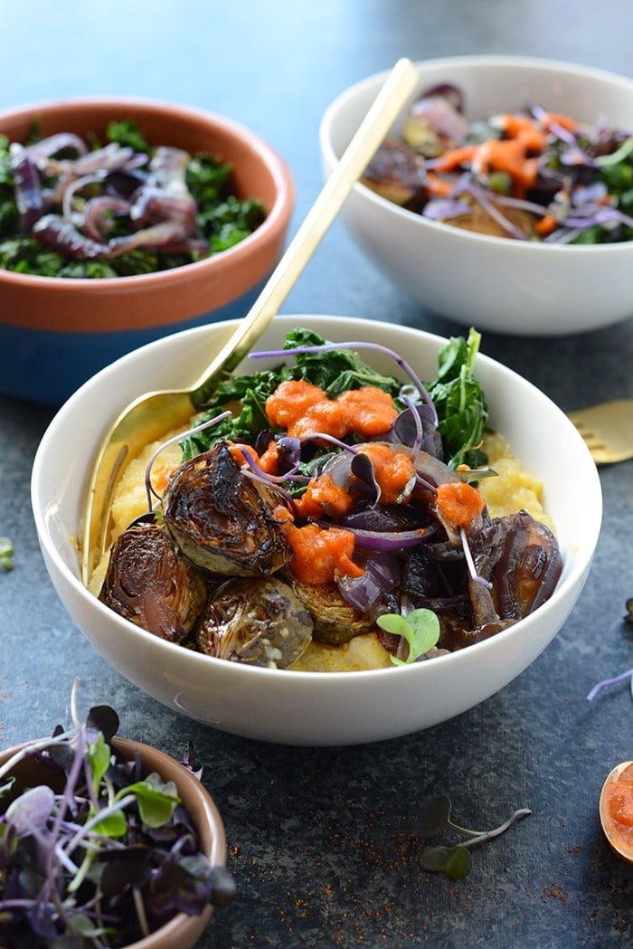 Vegetarian Meal Prep Idea: Meal prep like a vegetarian boss and make these Roasted Brussels Sprout Polenta Bowls fully equipped with caramelized onions and kale! 