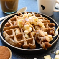 Apple cinnamon waffles on a plate.