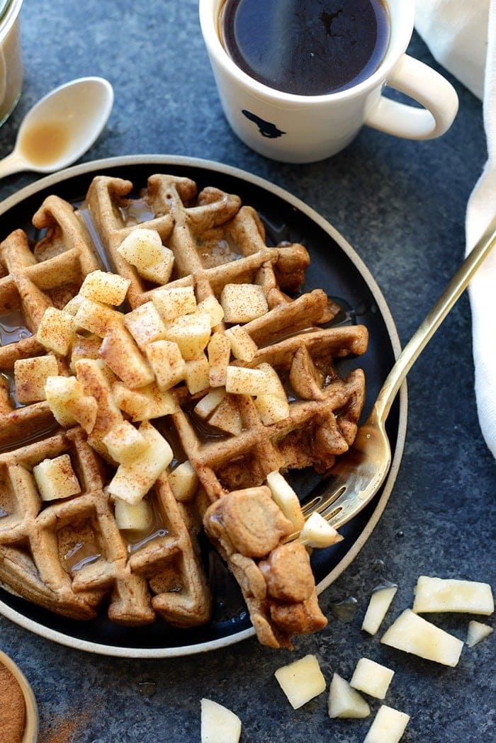 Tis the season of apples and cinnamon! You're going to love these HEALTHY caramel apple cinnamon waffles made with 100% whole wheat flour, apple chunks, tons of cinnamon, and a homemade caramel sauce made from full-fat coconut oil!