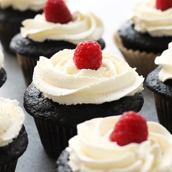 healthier chocolate cupcakes topped with a fresh raspberry