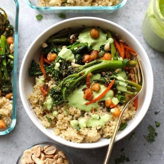A vegetarian bowl of Kung Pao quinoa with broccoli and greens.