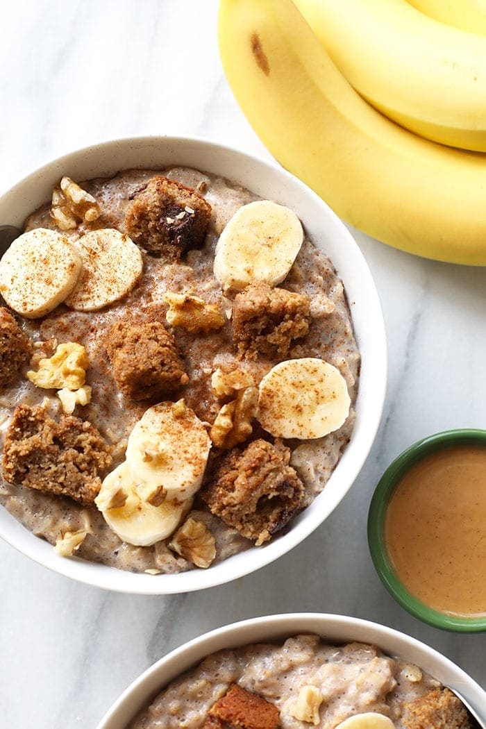 bowl of banana oatmeal with bananas and cinnamon