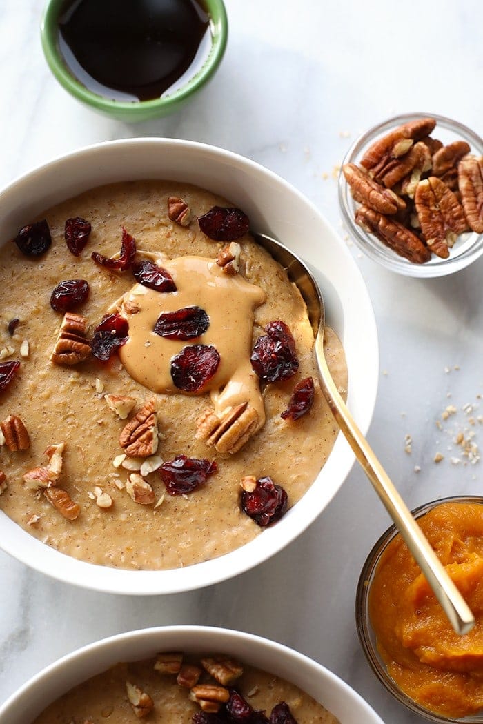 This Pumpkin Pie Slow Cooker Oatmeal is creamy as can be and full of flavor. It's made with steel cut oats, pumpkin puree, pumpkin ،e, and a hint of maple. 