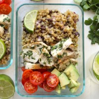 Cilantro lime chicken quinoa bowls with avocado and tomatoes.