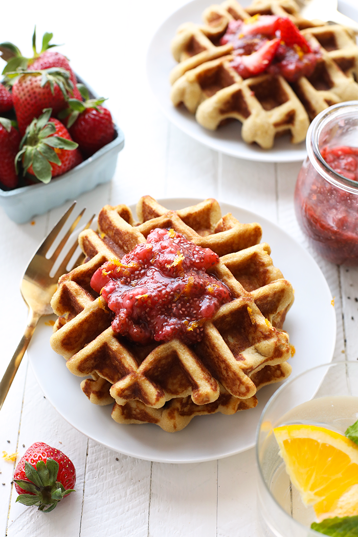 Looking for an all-purpose grain free waffle that tastes like the real deal? You are going to swoon over these almond flour waffles made with an almond flour + coconut flour base topped with a homemade strawberry chia compote! They're paleo, gluten free, and meal-prep friendly!