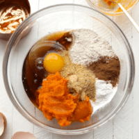 A bowl of ingredients for sweet potato pancakes.