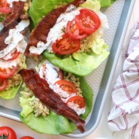 Lettuce wraps with bacon and tomatoes, perfect for a BLT-inspired appetizer.